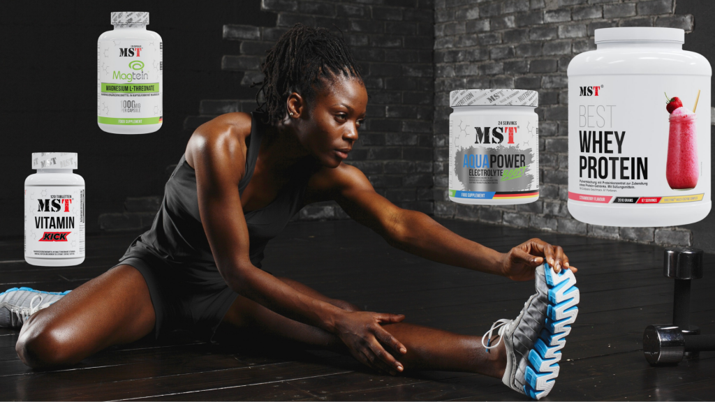 Collage of MST sports supplements set against a dark gray brick wall with a woman stretching in the center. White bottles of Vitamin Kick and Magnesium L-Threonate are on the left; an Aqua Power electrolyte tub and Best Whey Protein in strawberry flavor are on the right.